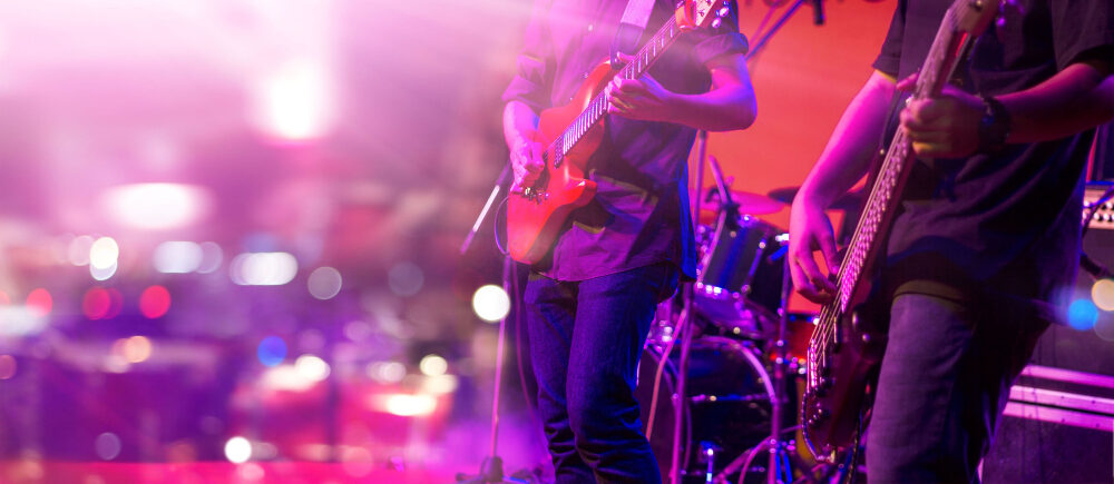 guitarists-with-colorful-lighting-stage